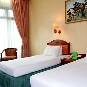 Pokój typu deluxe z dwoma pojedynczymi łóżkami
